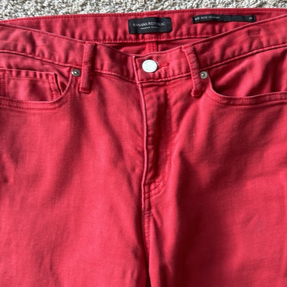 Muted red jeans. Waist is 15”, rise is 10” and length is 27” - Picture 2 of 7